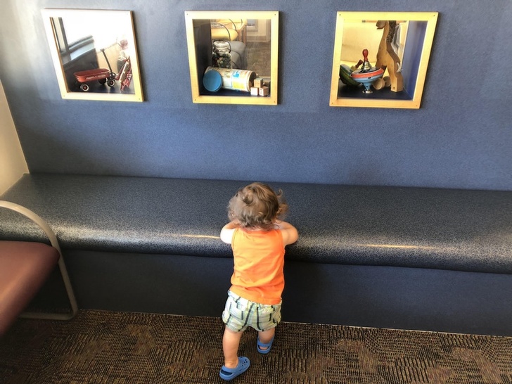 kid playing in waiting room