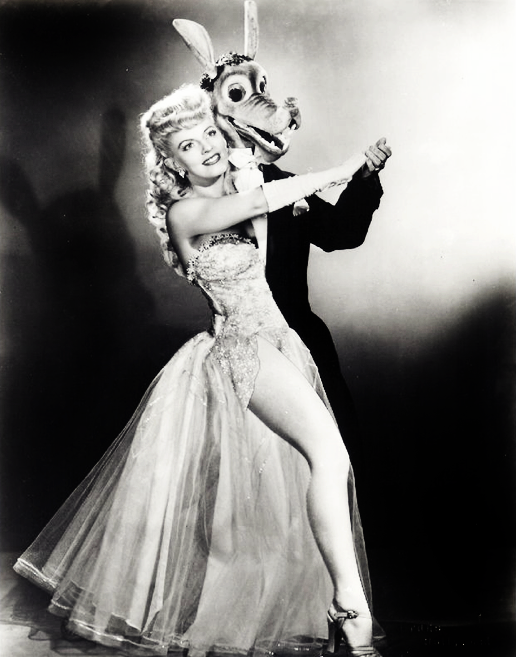 Burlesque dancer Maxine Holman in her famous 2 character costume in the US in 1950.