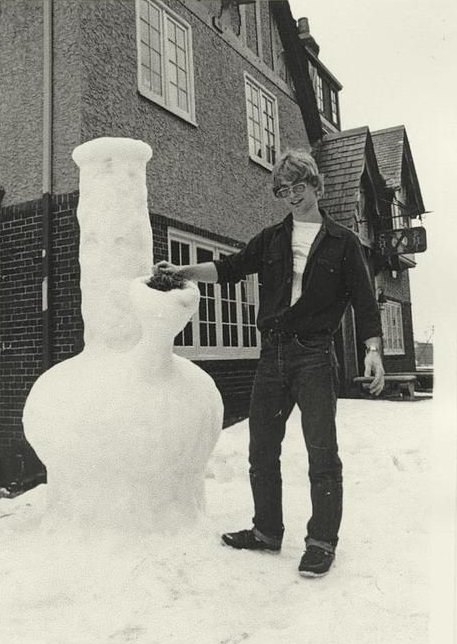 Serial killer Jeffrey Dahmer posing with a large snow bong he made in the US in 1982. He had already started murdering people and chopping them up and wearing their body parts when this picture was taken.