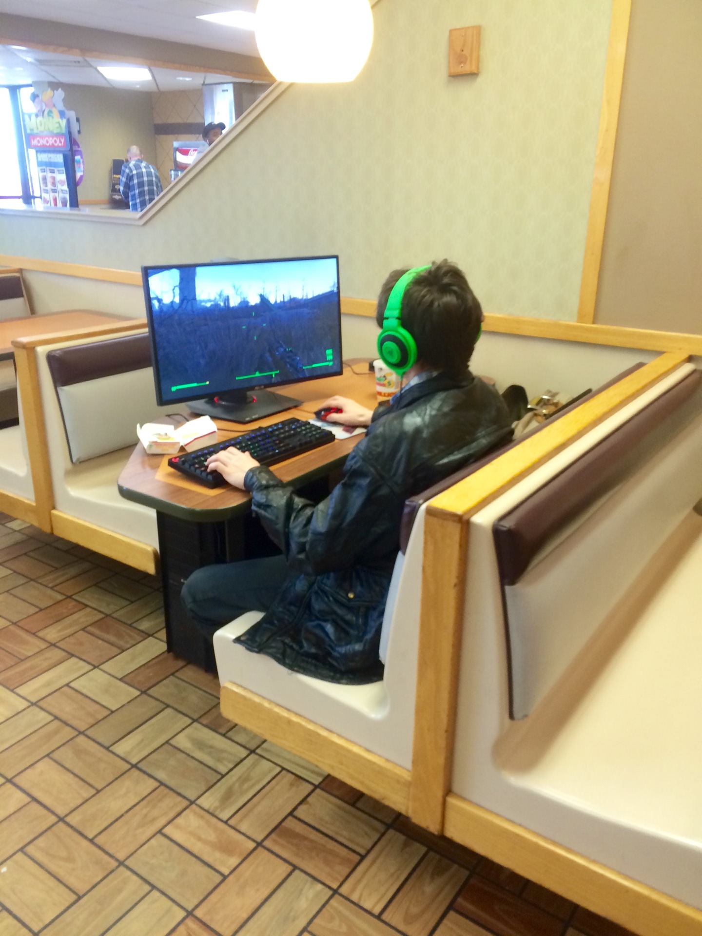 guy playing video games in mcdonalds - Monopoly