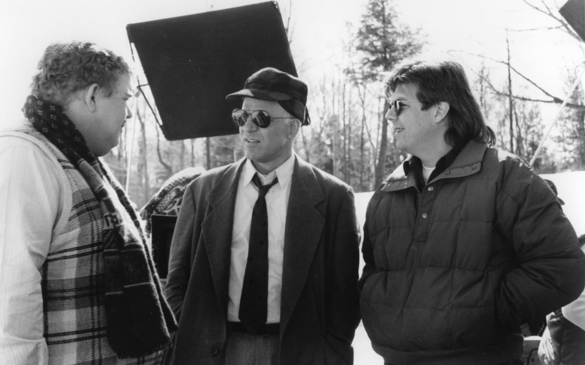 John Candy, Steven Martin and director John Hughes discuss a scene for Planes, Trains & Automobiles (1987).
