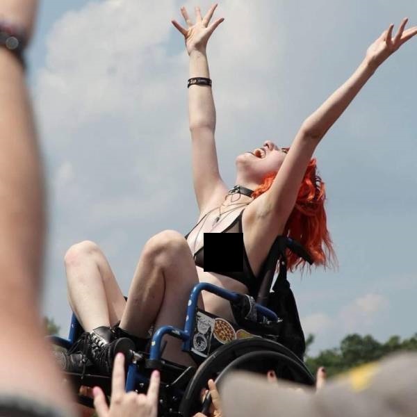 random pic girl in wheelchair crowd surfing