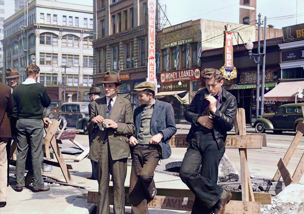 Unemployed men hanging out on the street in San Francisco, California. April 1939.