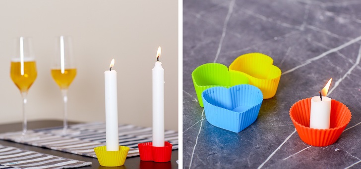 You can make a romantic dinner even if you don’t have any candle holders in your house. If the candles can stand on their own, you can use silicon molds: they will protect the table from wax stains. By the way, the wax doesn’t stick to the molds, so it will be easy to wash them after.