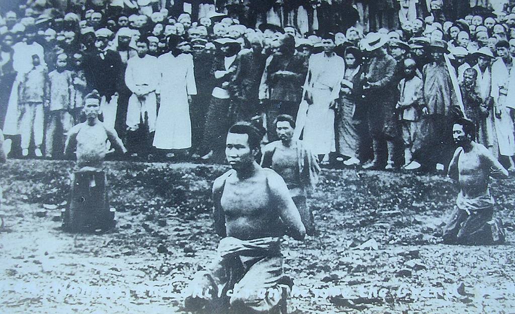 Men wait to be publicly executed by the Japanese somewhere in China in the late 1930s.