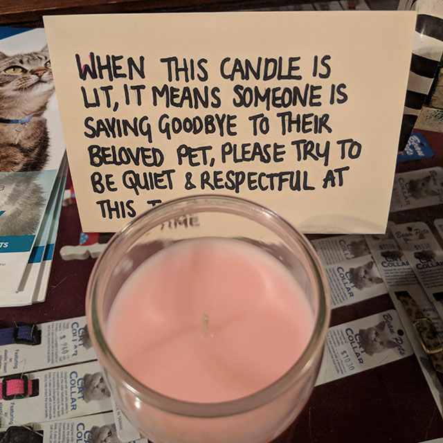 This vet has a sign and candle for when someone’s pet is dying