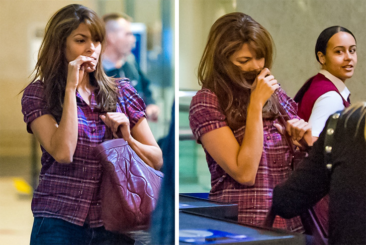 Eva Mendes uses her hair to hide.