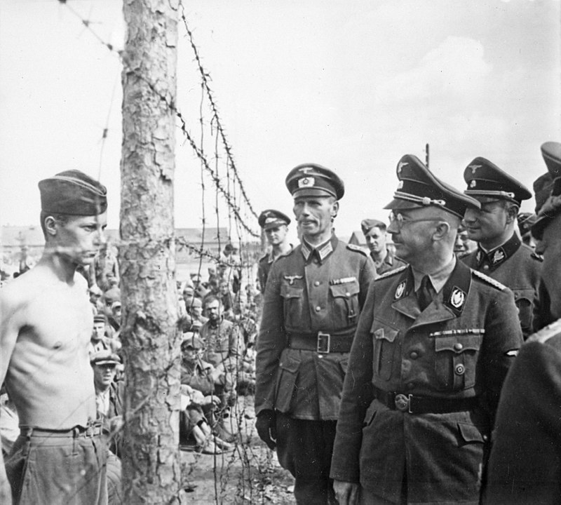 Himmler looks at a Soviet prisoner during a visit to Shirokaya Street Concentration Camp in Minsk, Belarus August 1941
