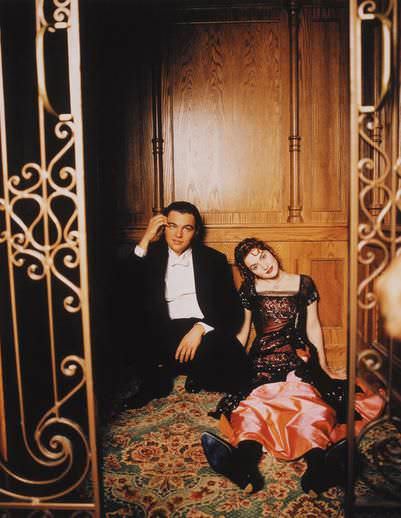 Leonardo DiCaprio and Kate Winslet taking a break between scenes of Titanic (1997).