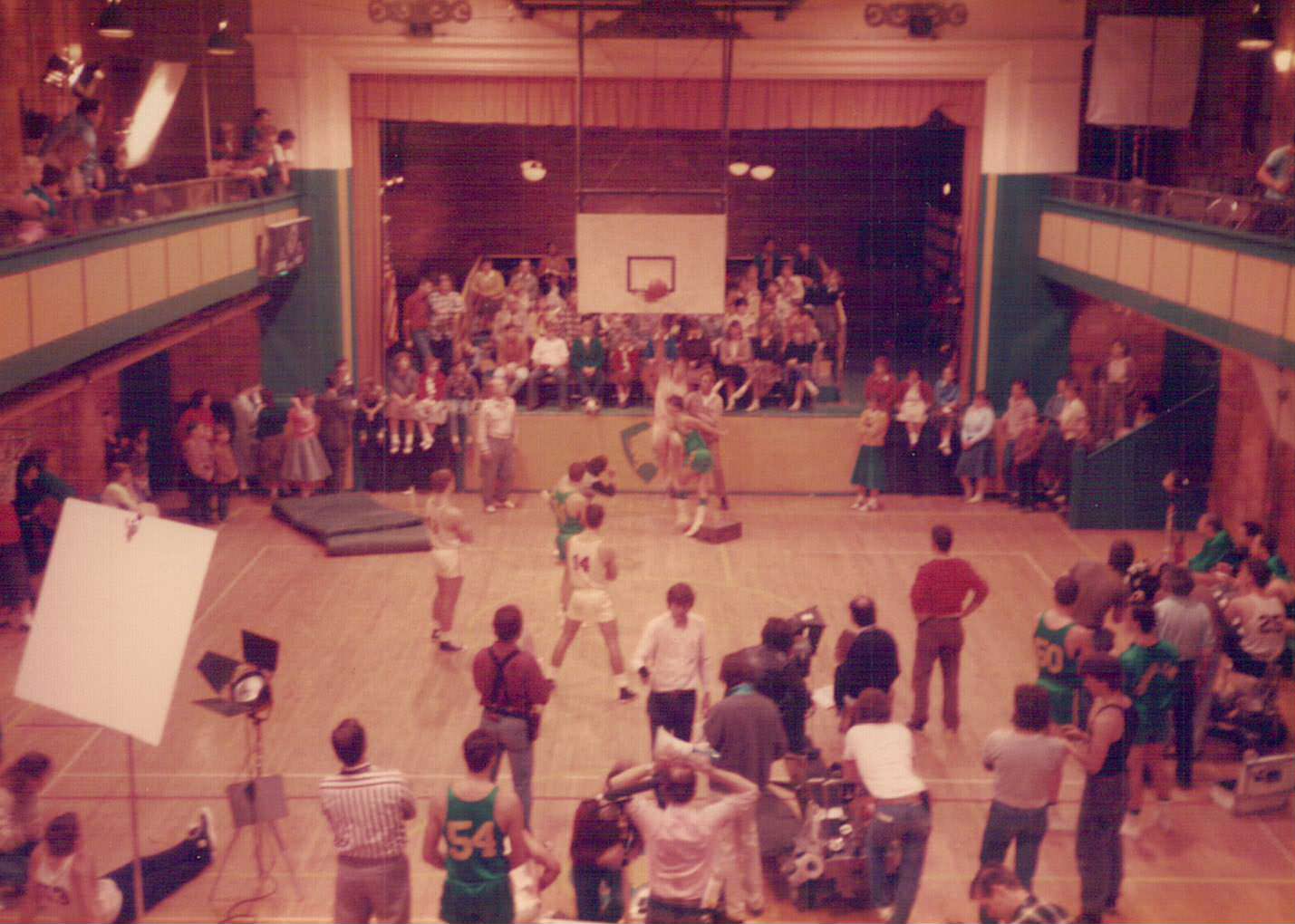 Cast and crew members shoot a scene in the film Hoosiers (1986).