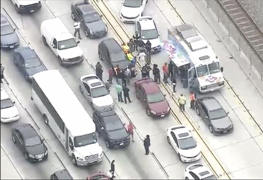 Tanker truck explodes on Los Angeles highway, taco truck proceed to sell tacos in traffic jam