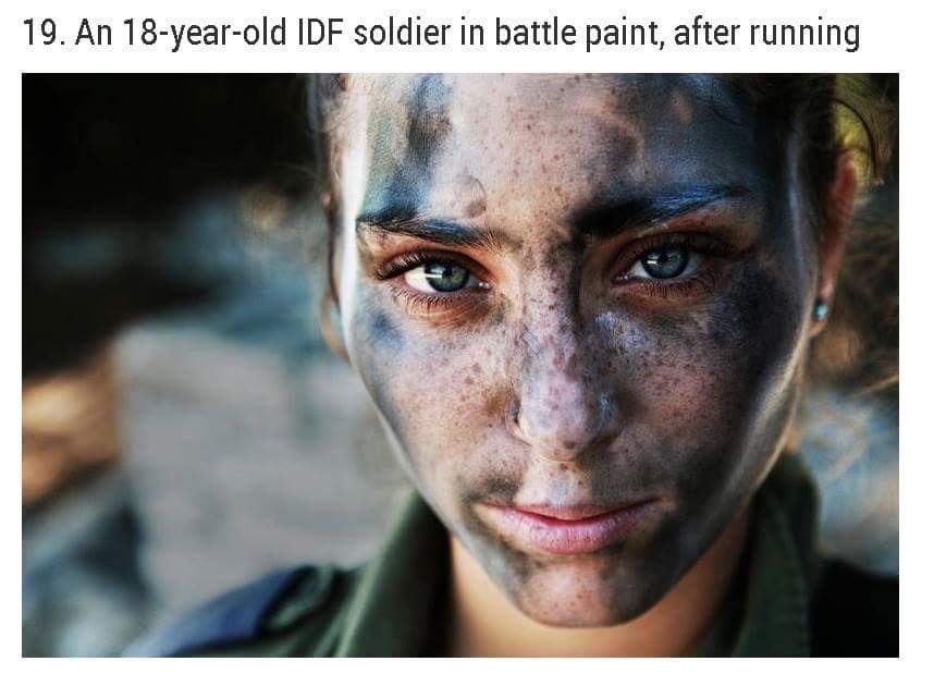 asher svidensky - 19. An 18yearold Idf soldier in battle paint, after running