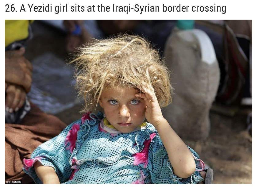 kurdish yazidi - 26. A Yezidi girl sits at the IraqiSyrian border crossing Reuters