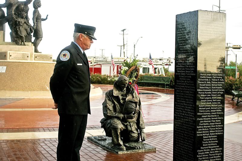 "Valor Commitment Dedication" in Grapevine, Texas.

New York firefighter Stephen Humenesky views the monument honoring the firefighters who lost their lives during a 9/11 remembrance ceremony in Grapevine, Texas. Humenesky, who worked on Engine 301 and was at ground zero that day, is now retired and lives in the area. He says he pays his respects here since he cannot make it back to New York.