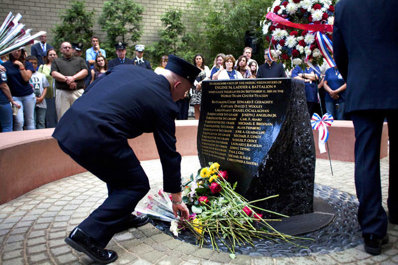 FDNY Engine 54, Ladder 4 Memorial in New York City.

A FDNY firefighter lays flowers at a memorial monument during the 10th anniversary service honoring the15 firefighters of Engine 54, Ladder 4 who died responding to the Sept. 11 terrorist attacks.