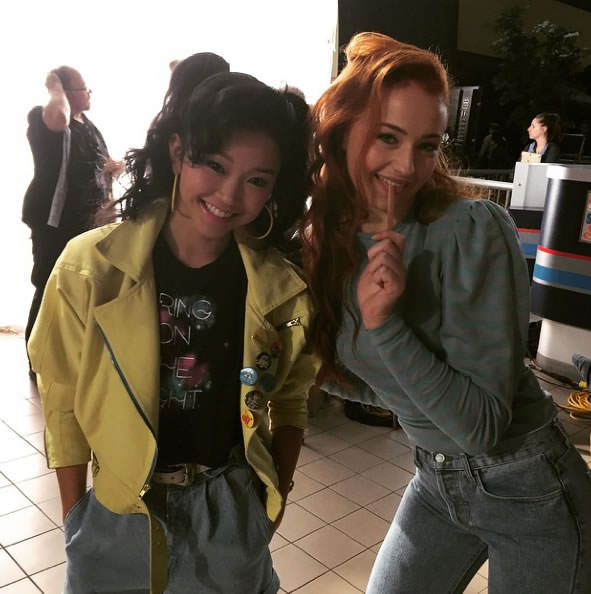 Lana Condor and Sophie Turner take a picture prior to a scene in X-Men: Apocalypse (2016).