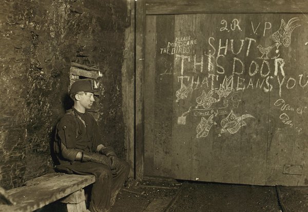 “Vance, A Trapper Boy, 15 Years Old. Has Trapped For Several Years In A West Va. Coal Mine. $.75 A Day For 10 Hours Work. All He Does Is Open And Shut This Door.

Location: West Virginia”
