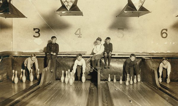 “Photo Of Boys Working In Arcade Bowling Alley, Trenton, N.J. Photo Taken Late At Night. The Boys Work Until Midnight And Later.

Location: Trenton, New Jersey”