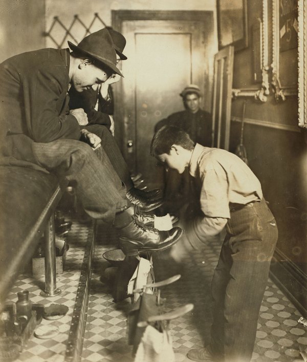“Greel’s Shoe-Shining Parlor, Indianapolis, Ind. Said He Was 15 Years Old. Works Some Nights Until 11. Taken At 10 P.m.

Location: Indianapolis, Indiana”
