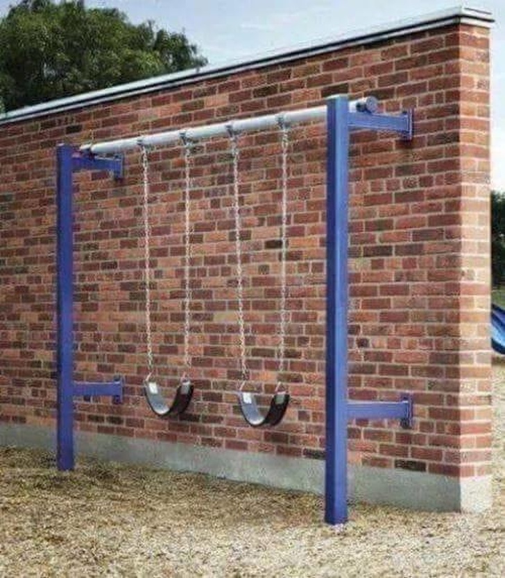 wtf swing set against wall