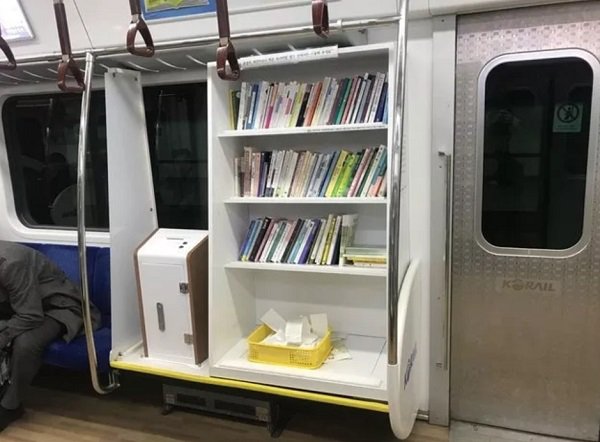 This subway has a library-by-donation.