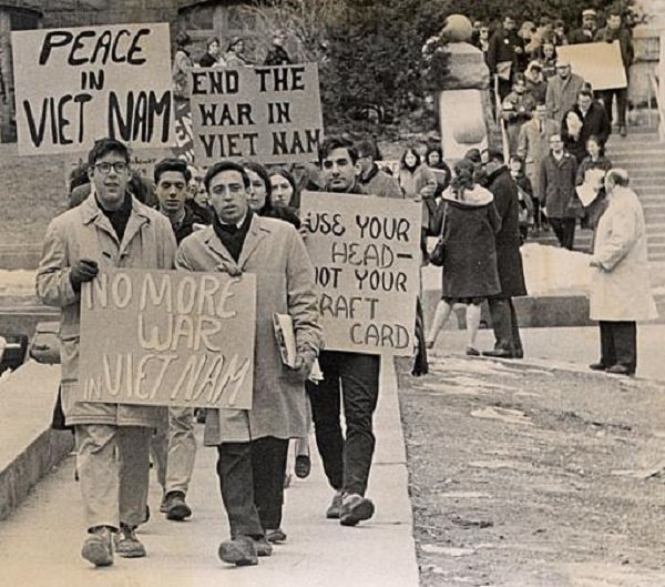 Student protesters marching down Langdon Street at the University of Wisconsin-Madison during the Vietnam War era.