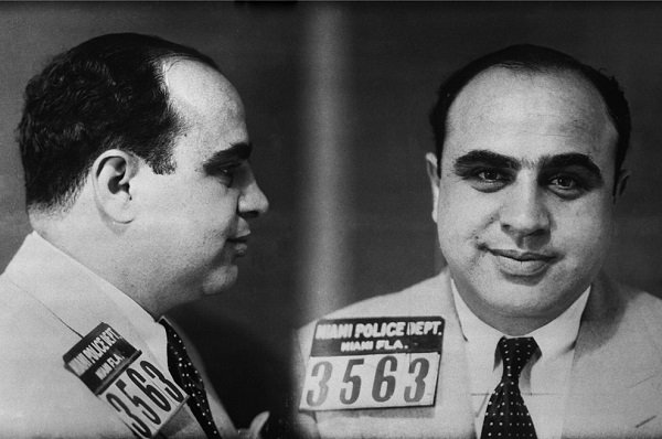 Infamous gangster Al Capone smiles for the camera.