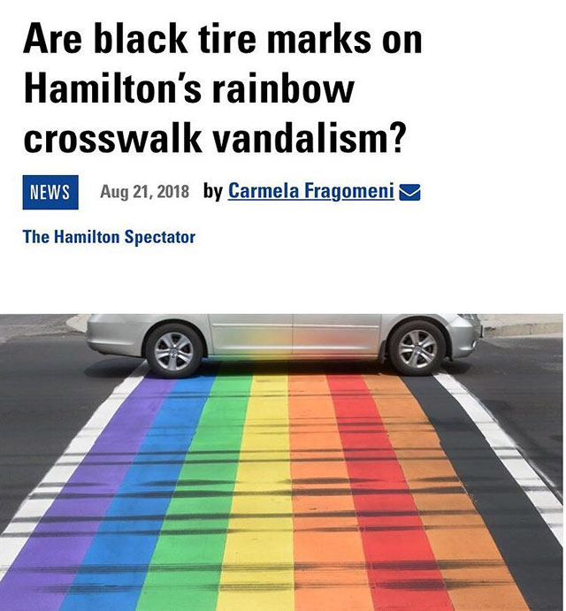 article questions if skid marks across rainbow crosswalk is vandalism