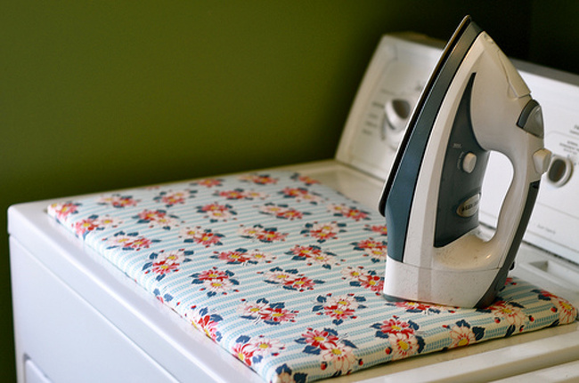 A convenient ironing board on the washing machine