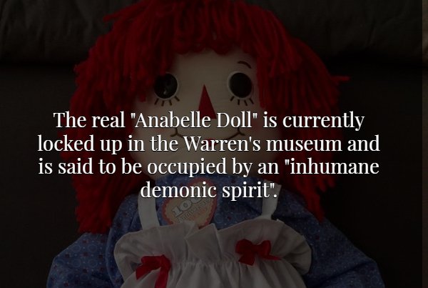 photo caption - The real "Anabelle Doll" is currently locked up in the Warren's museum and is said to be occupied by an "inhumane demonic spirit".