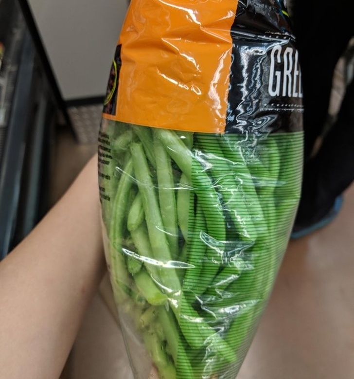 They pack green beans in the bag with green stripes so that unripe, pale beans look more green from a distance.