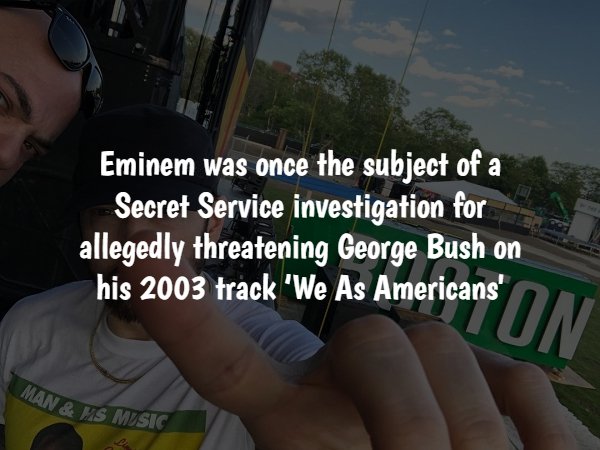 photo caption - Eminem was once the subject of a Secret Service investigation for allegedly threatening George Bush on his 2003 track 'We As Americans' Man & An Ms Music