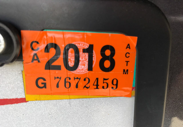 After installing car registration sticker, score it with a razor blade to prevent thieves from stealing it