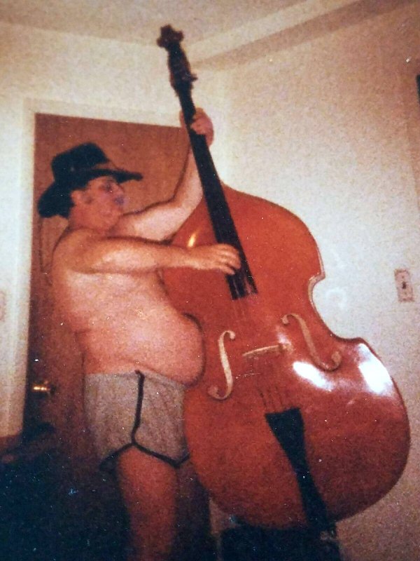 my grandpa playing a standup bass