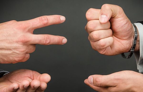 Win at Rock, Paper, Scissors.
An easy way to win at the game is to ask someone a question just before the game starts. If you drop a question then immediately proceed to say “Rock, Paper, Scissors,” chances are that they’ll throw scissors.