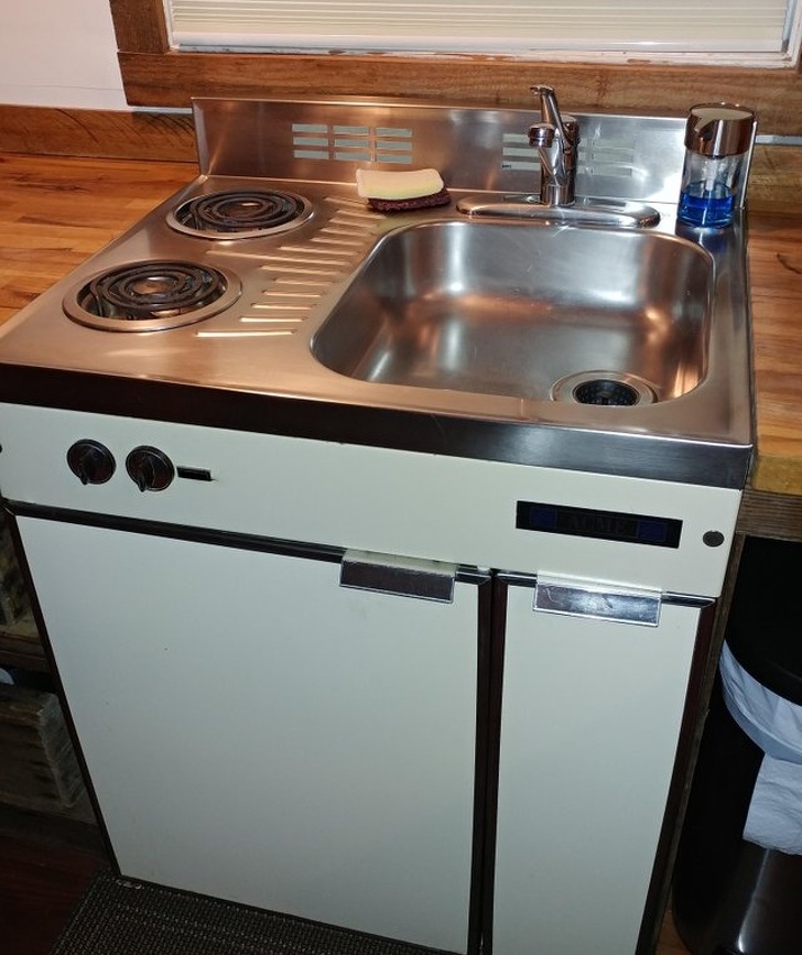 “Sink/stove/fridge combo in the tiny house I’m renting”