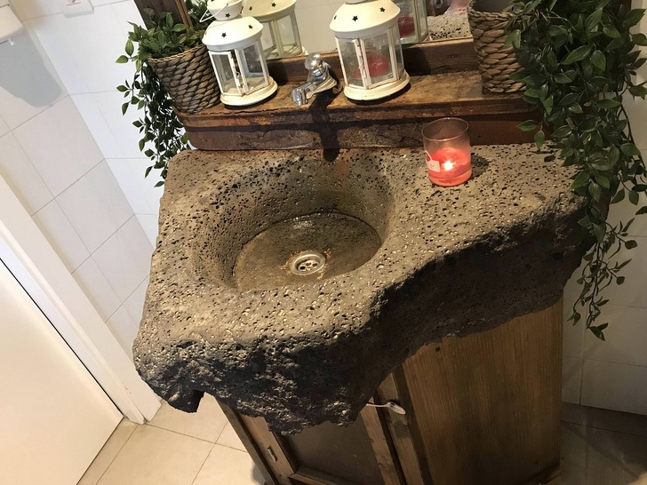 This bathroom sink is made of igneous rock from volcanic lava.