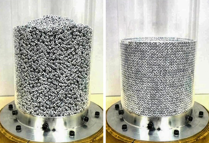 25,000 little dice were agitated in a cylinder to form concentric circles.