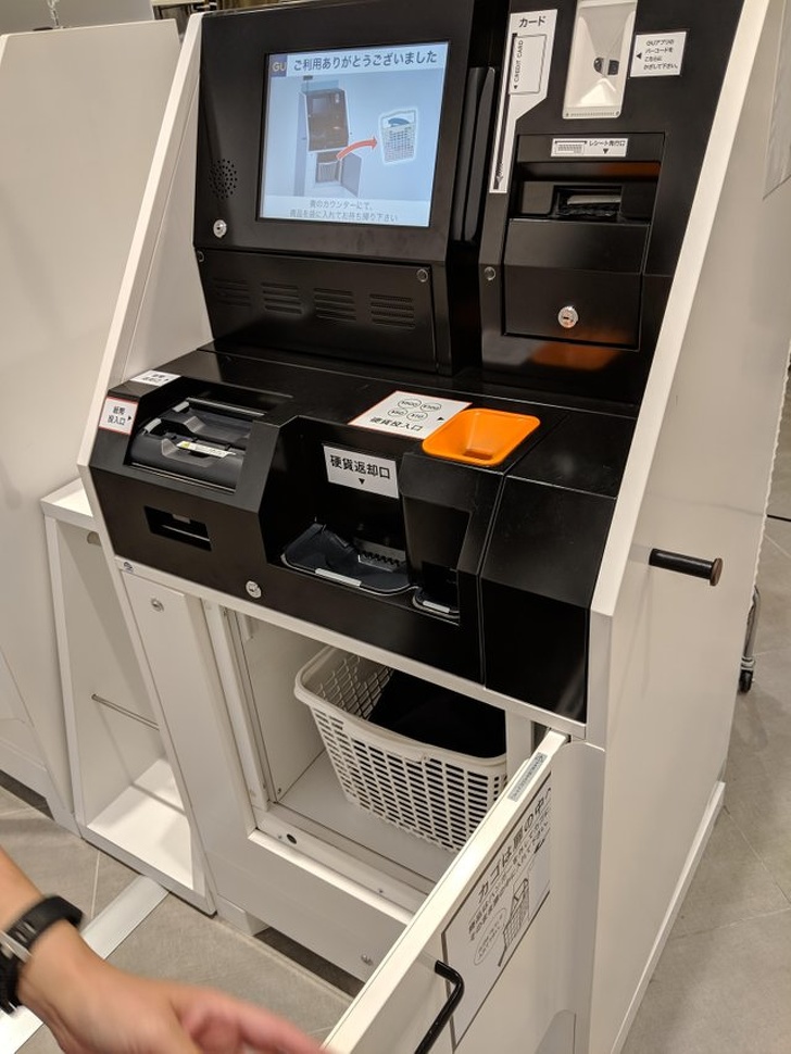 This self-checkout machine totals up your purchase, and you don’t even need to take your items out of the basket. Just put the entire basket in the bottom, pay, and then bag your stuff.