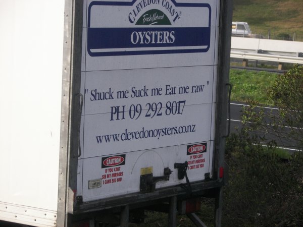 billboards signs funny - A Coast Clevey pesh from Oysters Shuck me Suck me Eat me raw Ph 09 292 8017 www clevedonoysters.co.nz Cautive Caution Fect Statori Tons