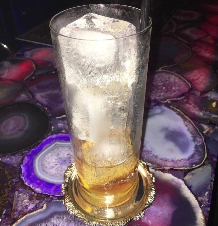 “I ordered a full drink...80% of the glass is filled with ice cubes.”