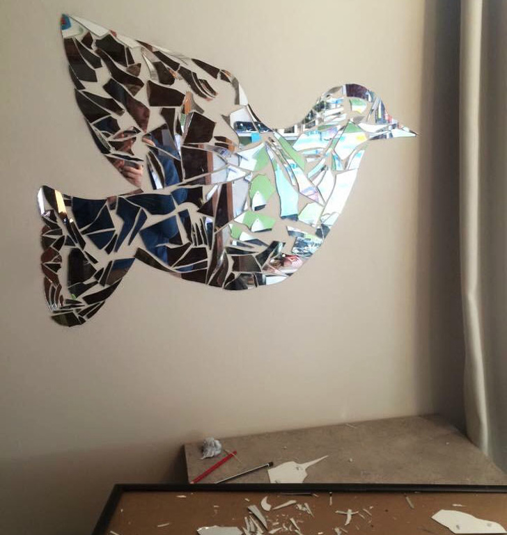 “A dove I made out of a broken mirror”..