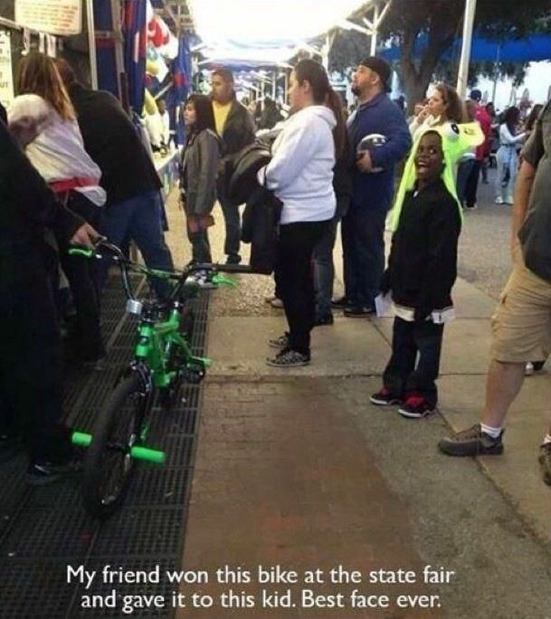 faith in human restored - > My friend won this bike at the state fair and gave it to this kid. Best face ever.