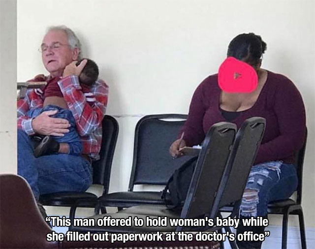 man holds strangers baby - This man offered to hold woman's baby while she filled out paperwork at the doctor's office"