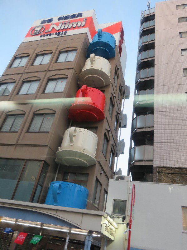 These apartments in Japan have teacup shaped balconies.