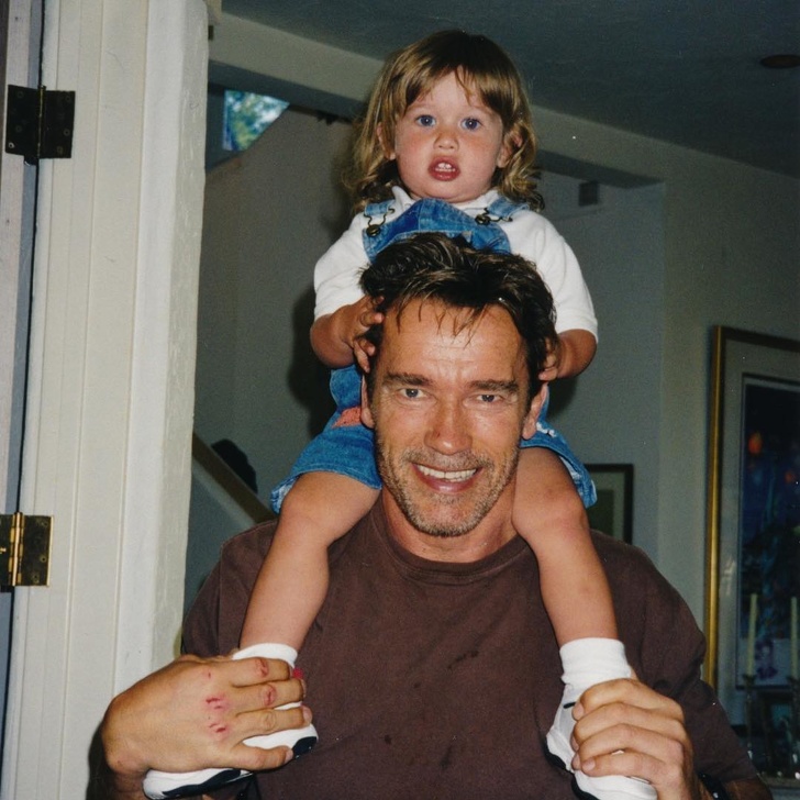 Arnold Schwarzenegger with his youngest son