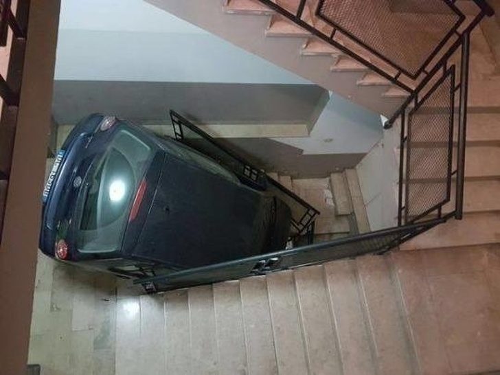 car stuck in stairwell -