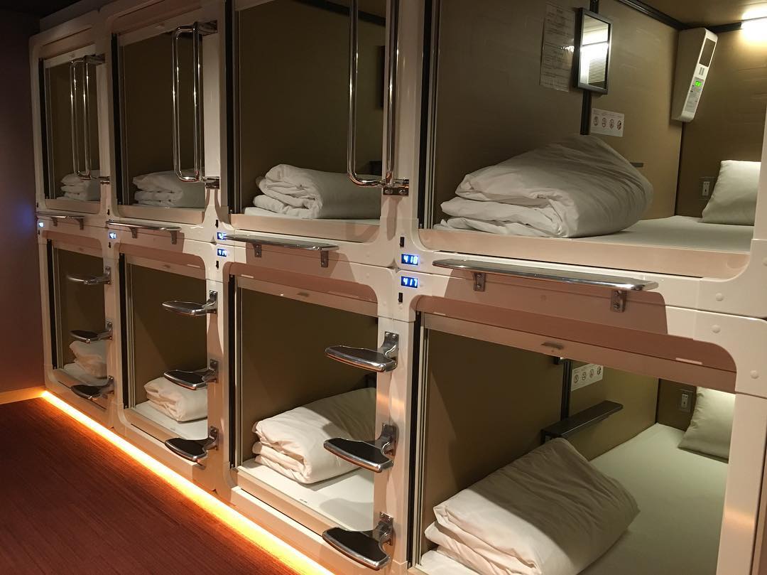 Tiny capsule hotels are really popular for their low prices, privacy, and small bonuses like Wi-Fi and a hanging TV.