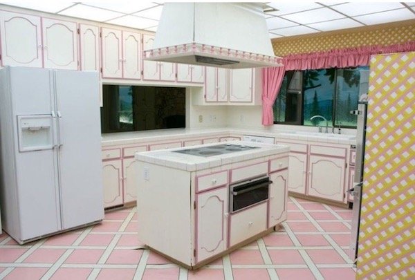 How about that kitchen. Came with a built in coffee maker and toaster, and is a perfect time capsule for the decorating aesthetic at the time.