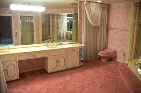 There’s pink shag carpeting in the bathroom.